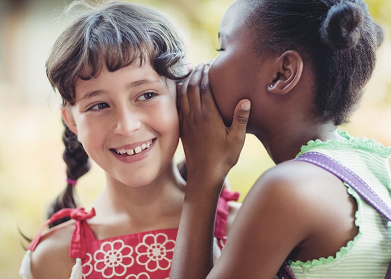 children-telling-secrets
